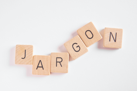 How can jargon be a barrier to communication?