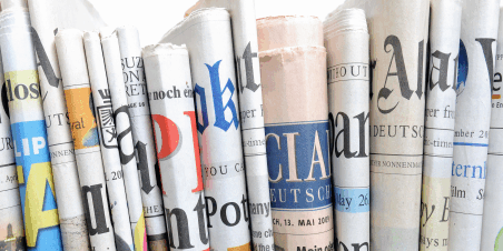 Try these techniques — from alliteration to single-syllable words — for creating catchy headlines. <a href="https://www.shutterstock.com/image-photo/row-newspapers-179149739" rel="noopener" target="_blank"><em>Image by qvist</em></a>