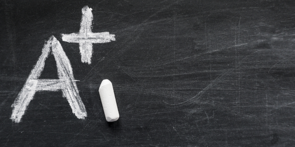 <strong>Turn ideas into things</strong> Researchers found an almost one-to-one correlation between how concrete a passage was and how easy it was to understand. <a href="https://www.istockphoto.com/photo/grade-a-on-blackboard-with-copy-space-gm1125332872-295781724"><em>Photo credit: harunhalici</em></a>