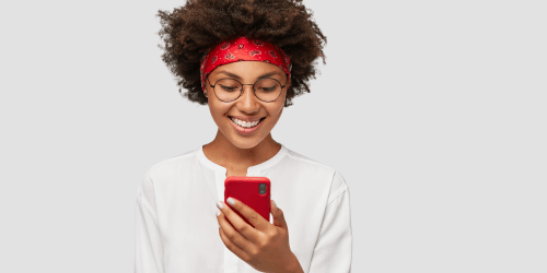 <strong>Read this!</strong> To become a better writer, become a better reader. <a href="https://www.shutterstock.com/es/image-photo/content-african-woman-charming-smile-laughs-1186050244" rel="noopener" target="_blank"><em>Image by Cast Of Thousands</em></a>